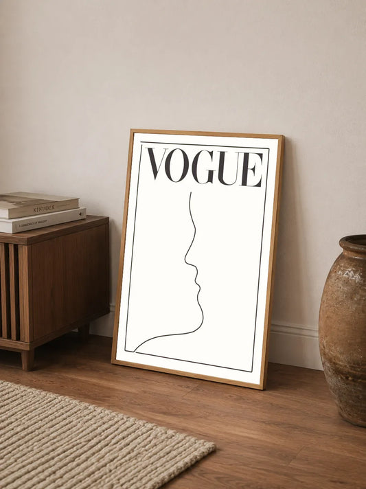 Minimalist typographic poster with stylized black lettering accented by metallic gold details on a clean white background