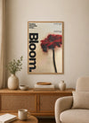 Portrait wall art featuring black background with delicate white cursive typography "Bloom, Then Break" surrounding a stylized botanical arrangement