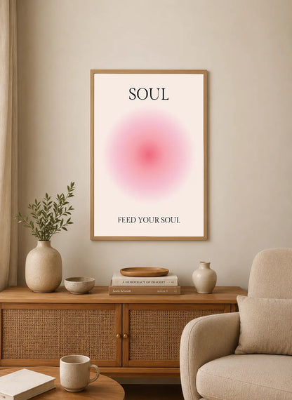Portrait poster with centered pink gradient circle and black serif text "SOUL" above and "FEED YOUR SOUL" below on off-white background