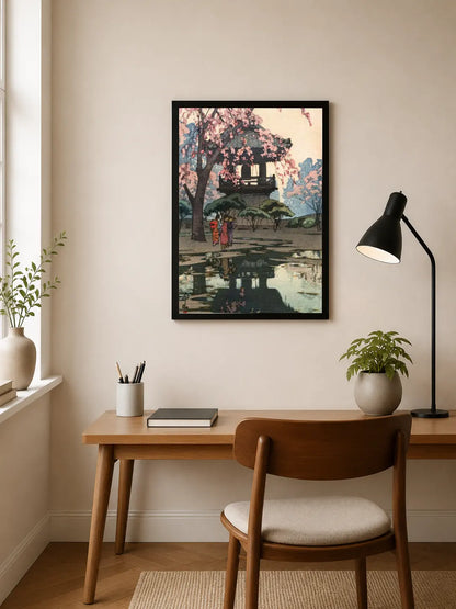 Portrait print depicts traditional Japanese pagoda under pink cherry blossoms with figures walking on a reflective path, rendered in soft watercolor