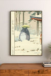 Portrait poster featuring Totoro holding a yellow umbrella in a snowy forest with traditional Japanese architecture and vertical calligraphy on the