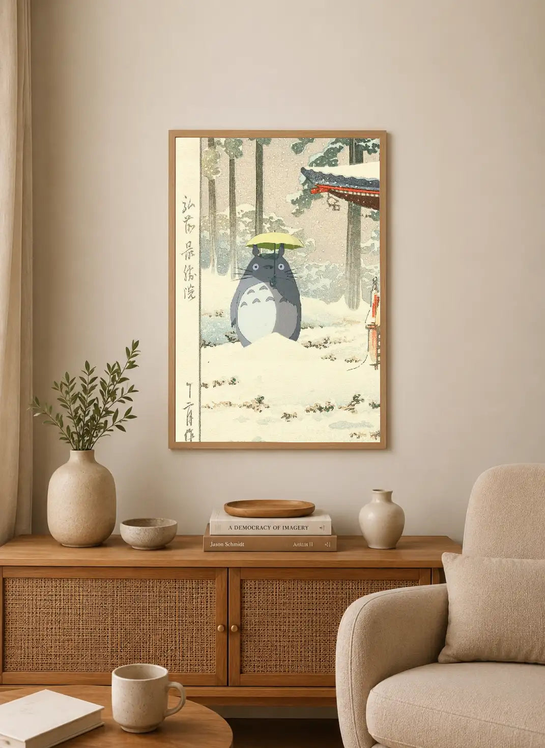 Portrait print depicts Totoro in snowy forest holding green umbrella, with Japanese calligraphy on left side