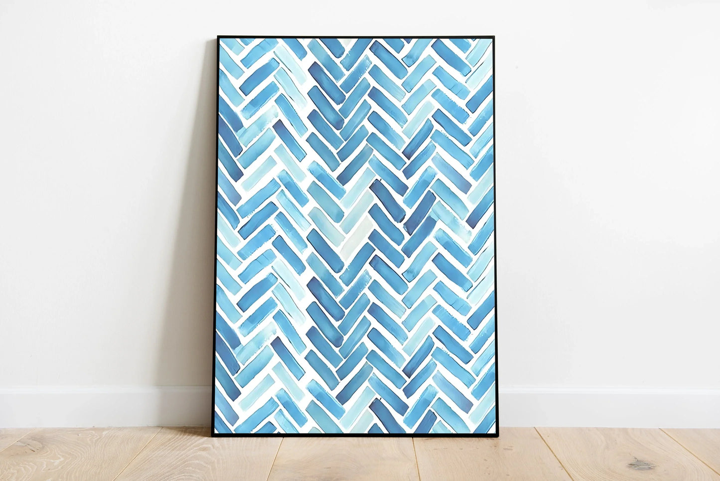 Minimalist graphic art print with crisp, high-contrast blue herringbone lines set against white, emphasizing clean architectural symmetry