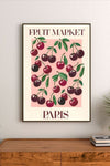 Pastel illustration with stylized pink lettering and delicate drawings of citrus slices, cherries, and floral motifs in a soft spring color scheme