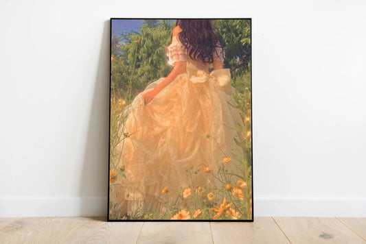 A whimsical illustration featuring a flowing yellow sundress and floral patterns in a soft, romantic cottagecore style