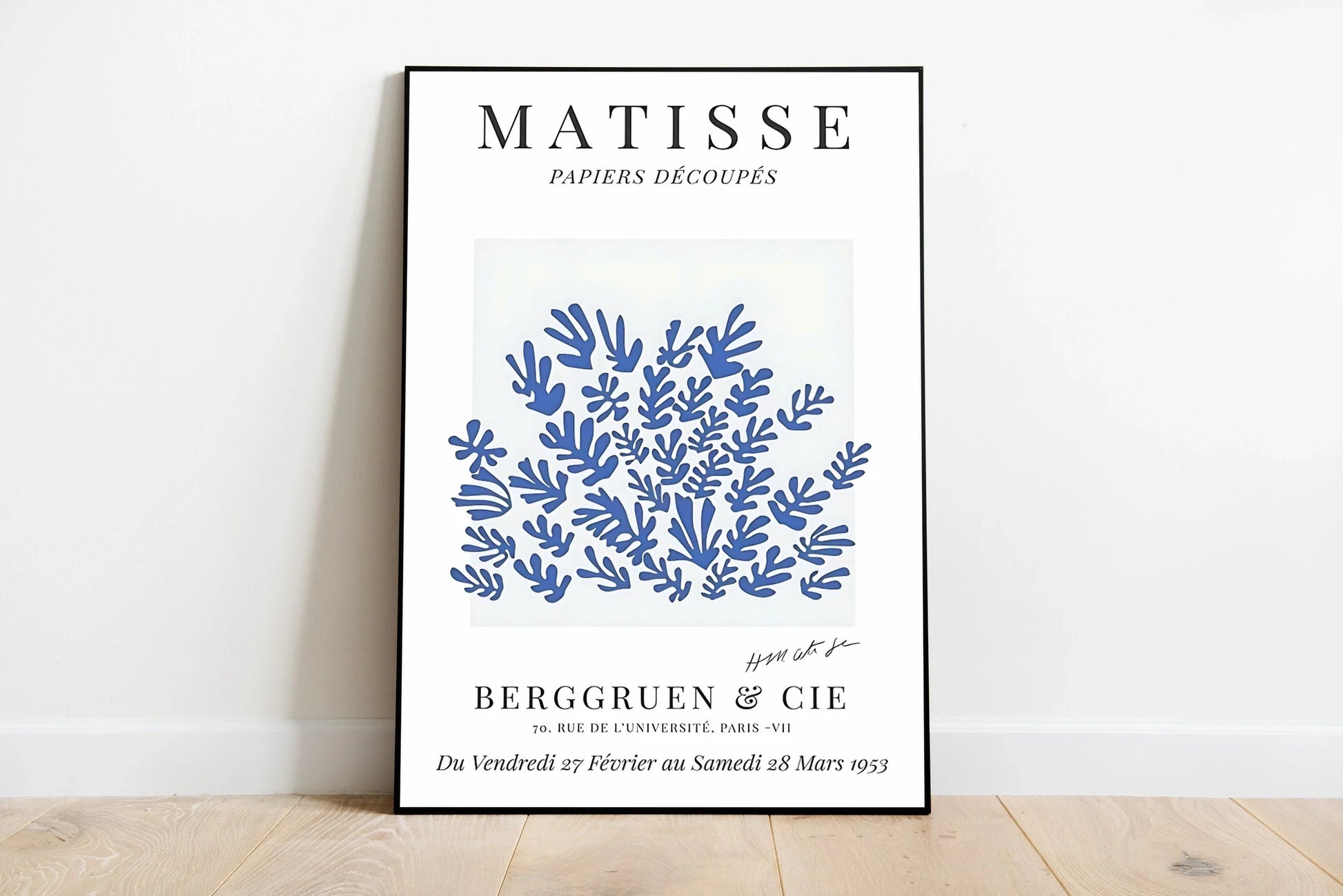 Stylized portrait poster collage featuring intricate cutouts of varied leaves, flowers, and vines in shades of emerald green and pastel colors