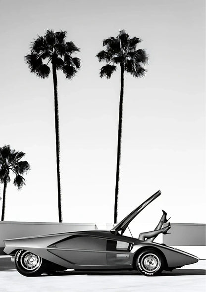 Landscape art composition displaying fragmented automotive typography alongside geometric elements in deep reds and blacks