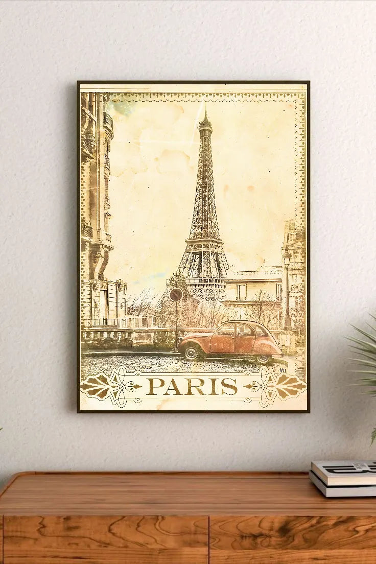Portrait poster with sepia-toned Eiffel Tower and vintage car, ornate "PARIS" typography beneath, aged paper texture style