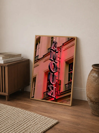 A typographic poster featuring abstract faces and flowing lines in black, white, and vibrant pink hues, arranged vertically on a portrait canvas