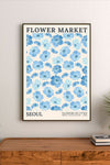 Portrait poster featuring blue petals and pink lemonade themes with stylized typography and delicate pastel floral illustrations