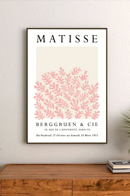 Pastel botanicals poster featuring soft yellow lemons, delicate green leaves, and script typography arranged across a light blush pink background