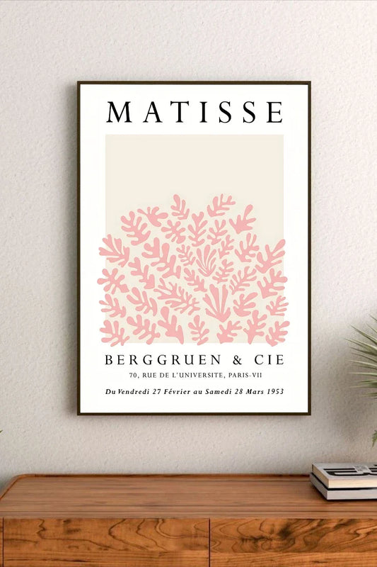 Pastel botanicals poster featuring soft yellow lemons, delicate green leaves, and script typography arranged across a light blush pink background