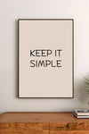 Portrait poster with beige background and black handwritten-style text reading "KEEP IT SIMPLE" in centered upper-middle position