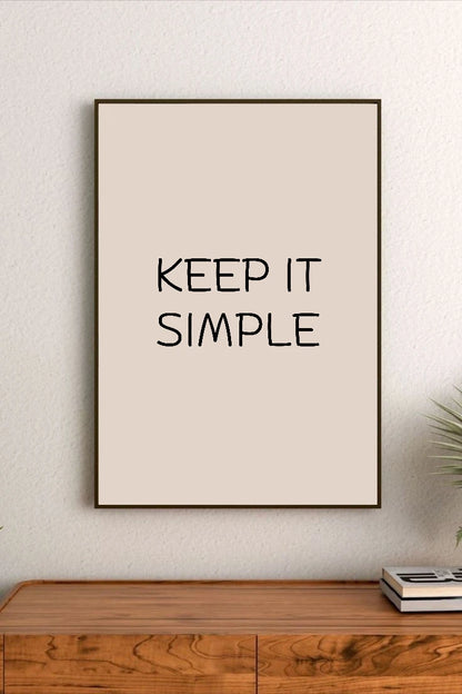 Portrait poster with beige background and black handwritten-style text reading "KEEP IT SIMPLE" in centered upper-middle position