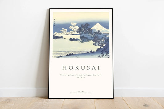 Horizontal marine artwork depicting a dramatic vista of deep sapphire blue ocean waters extending towards the distant, light-colored shore