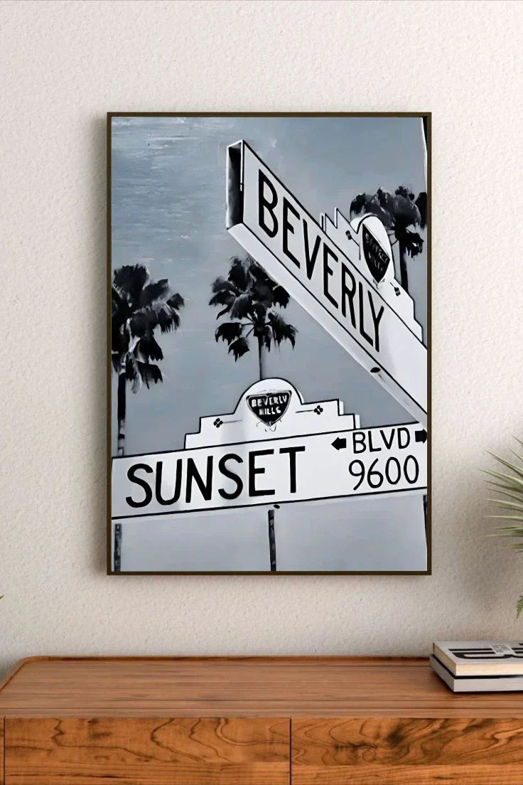 Retro poster artwork featuring a vibrant sunset gradient of orange and pink over urban elements and stylized typography
