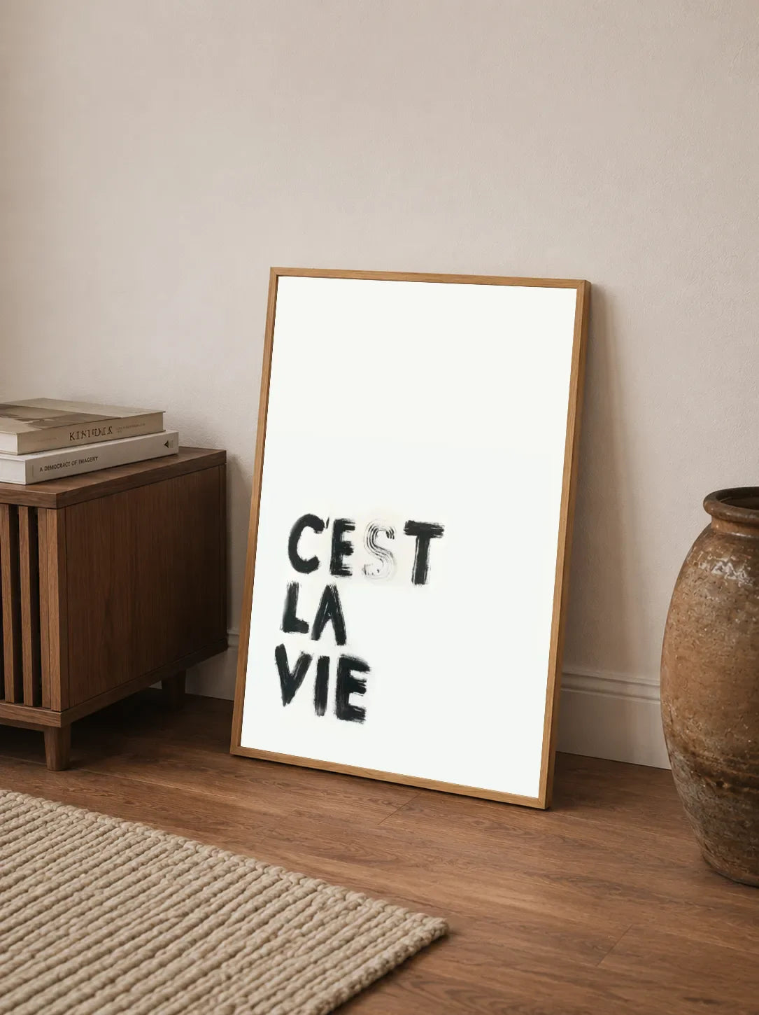 Vertical abstract textual poster design showcasing dark typography details against an expanse of creamy white background paper