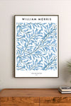 Blue chinoiserie willow pattern depicting a serene pagoda and flowing river in a detailed portrait composition of blue branches